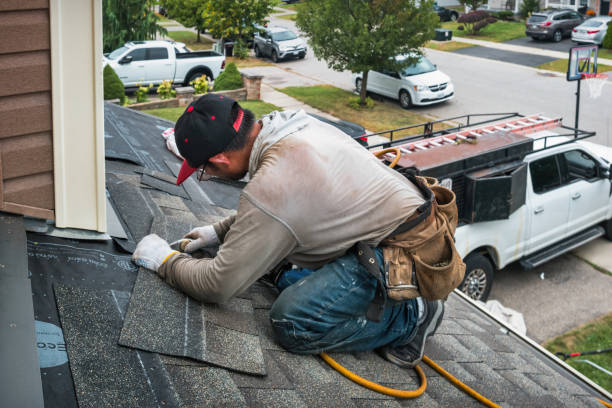 Professional Gutter Repair And Installation technician working in Fowler, MI